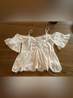 Francesca's Collections Cream Off-Shoulder Satin Peplum Top